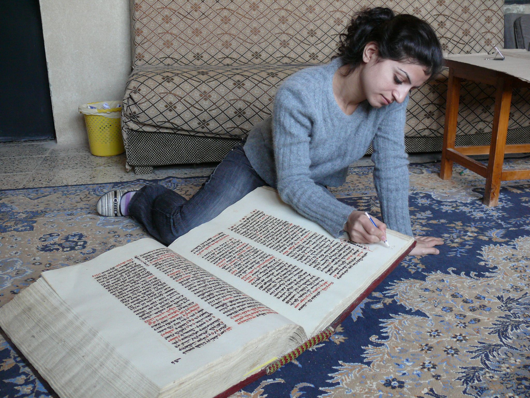 Technician paginating a manuscript at CNMO